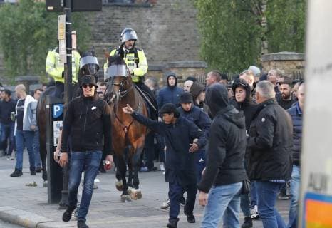 Ajax fans confront police with batons drawn before the UEFA Champions League match at the Tottenham Hotspur Stadium, London. Picture date: 30th April 2019. Picture credit should read: David Klein Sportimage EDITORIAL USE ONLY. No use with unauthorised audio, video, data, fixture lists, club league logos or live services. Online in-match use limited to 120 images, no video emulation. No use in betting, games or single club league player publications. SPI-0063-0006