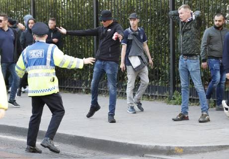 Ajax fans confront police with batons drawn before the UEFA Champions League match at the Tottenham Hotspur Stadium, London. Picture date: 30th April 2019. Picture credit should read: David Klein Sportimage EDITORIAL USE ONLY. No use with unauthorised audio, video, data, fixture lists, club league logos or live services. Online in-match use limited to 120 images, no video emulation. No use in betting, games or single club league player publications. SPI-0063-0007