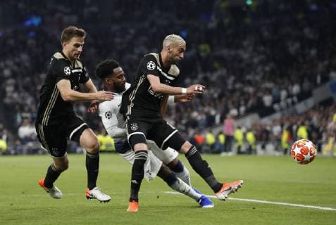 Hakim Ziyech and Lasse Schone of Ajax close down Danny Rose of Tottenham dispossessed during the UEFA Champions League match at the Tottenham Hotspur Stadium, London. Picture date: 30th April 2019. Picture credit should read: David Klein Sportimage EDITORIAL USE ONLY. No use with unauthorised audio, video, data, fixture lists, club league logos or live services. Online in-match use limited to 120 images, no video emulation. No use in betting, games or single club league player publications. SPI-0063-0089