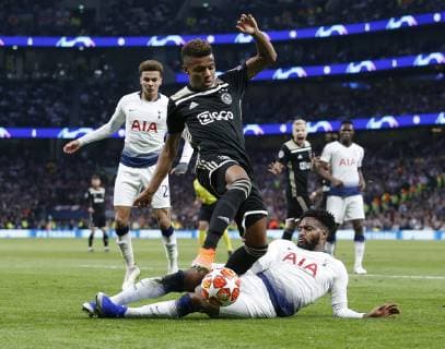 (190501) -- LONDON, May 1, 2019 -- Ajax s David Neres (R, top) is tackled by Tottenham Hotspur s Danny Rose (Bottom) during the UEFA Champions League semifinal first leg soccer match between Tottenham Hotspur and Ajax at the Tottenham Hotspur Stadium in London, Britain on April 30, 2019. Ajax won 1-0. ) FOR EDITORIAL USE ONLY. NOT FOR SALE FOR MARKETING OR ADVERTISING CAMPAIGNS. NO USE WITH UNAUTHORIZED AUDIO, VIDEO, DATA, FIXTURE LISTS, CLUB LEAGUE LOGOS OR LIVE SERVICES. ONLINE IN-MATCH USE LIMITED TO 45 IMAGES, NO VIDEO EMULATION. NO USE IN BETTING, GAMES OR SINGLE CLUB LEAGUE PLAYER PUBLICATIONS. (SP)BRITAIN-LONDON-FOOTBALL-UEFA CHAMPIONS LEAGUE-TOTTENHAM HOTSPUR VS AJAX MatthewxImpey