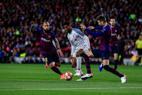 May 1, 2019 - Barcelona, BARCELONA, Spain - 05 Georginio Wijnaldum of Liverpool FC defended by 03 Gerard Pique of FC Barcelona Barca and 22 Arturo Vidal of FC Barcelona during the UEFA Champions League first leg match of Semi final between FC Barcelona and Liverpool FC in Camp Nou Stadium in Barcelona 01 of May of 2019, Spain. Soccer: Champions League - FC Barcelona v Liverpool - ZUMAa181 20190501_zaa_a181_002 Copyright: xAFP7x