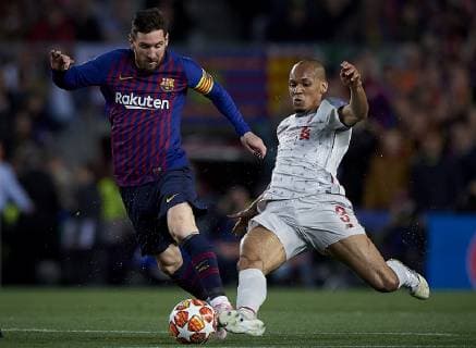 Soccer: UEFA Champions League 2018 19 : Lionel Messi (L) of Barcelona competes for the ball with Fabinho of Liverpool during the UEFA Champions League Match between FC Barcelona Barca vs Liverpool FC at Camp Nou Stadium in Barcelona, Spain, May 1, 2019. Noxthirdxpartyxsales  (102332733)
