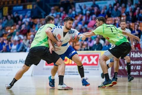 Yannick Dräger 19 (TV Emsdetten), Jonas Hoenicke 20 (Dessau-Rosslauer HV 06), Janko Bozovic 77 (TV Emsdetten) waehrend der Begegnung in der Handball 2. Bundesliga (Herren) - Saison 2018-2019 zwischen Dessau-Rosslauer HV 06 und TV Emsdetten in der Anhalt Arena am 5. May 2019 in Dessau-Rosslau, Sachsen Anhalt, Deutschland