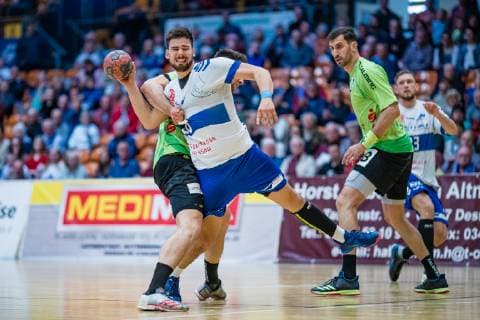 Yannick Dräger 19 (TV Emsdetten), Jonas Hoenicke 20 (Dessau-Rosslauer HV 06), Janko Bozovic 77 (TV Emsdetten) waehrend der Begegnung in der Handball 2. Bundesliga (Herren) - Saison 2018-2019 zwischen Dessau-Rosslauer HV 06 und TV Emsdetten in der Anhalt Arena am 5. May 2019 in Dessau-Rosslau, Sachsen Anhalt, Deutschland