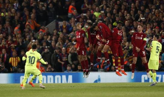 Liverpool s Virgil van Dijk blocks Barcelona s Lionel Messi?s freekick during the UEFA Champions League match at Anfield, Liverpool. Picture date: 7th May 2019. Picture credit should read: Darren Staples Sportimage EDITORIAL USE ONLY. No use with unauthorised audio, video, data, fixture lists, club league logos or live services. Online in-match use limited to 120 images, no video emulation. No use in betting, games or single club league player publications. SPI-0072-0059