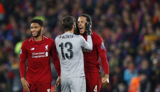 Football - 2018 2019 UEFA Champions League - Semi-Final, Second Leg: Liverpool (0) vs. Barcelona (3) Alison Becker of Liverpool and Virgil van Dijk of Liverpool celebrate winning the match at Anfield. COLORSPORT LYNNE CAMERON 