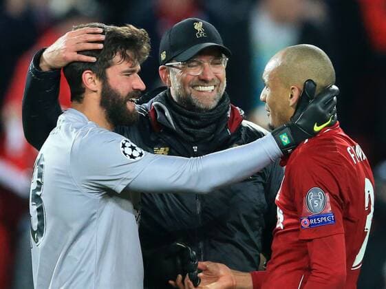 7th May 2019, Anfield, Liverpool, England; UEFA Champions League football, semi final second leg, Liverpool versus FC Barcelona Barca Liverpool manager Jurgen Klopp celebrates after the final whistle with Liverpool goalkeeper Alisson Becker and Fabinho of Liverpool  ActionPlus12132197 DavidxBlunsden