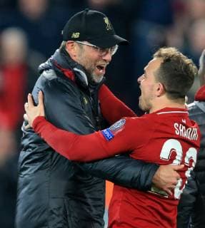 7th May 2019, Anfield, Liverpool, England; UEFA Champions League football, semi final second leg, Liverpool versus FC Barcelona Barca Liverpool manager Jurgen Klopp hugs Xherdan Shaqiri of Liverpool after the end of the match  ActionPlus12132205 DavidxBlunsden
