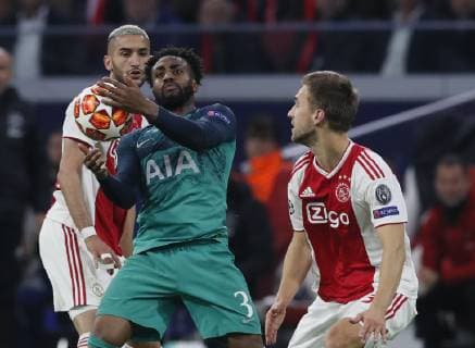 Danny Rose of Tottenham handles the ball then receives a yellow card after he threw the ball away during the UEFA Champions League match at the Johan Cruyff Arena, Amsterdam. Picture date: 8th May 2019. Picture credit should read: David Klein Sportimage EDITORIAL USE ONLY. No use with unauthorised audio, video, data, fixture lists, club league logos or live services. Online in-match use limited to 120 images, no video emulation. No use in betting, games or single club league player publications. SPI-0075-0087