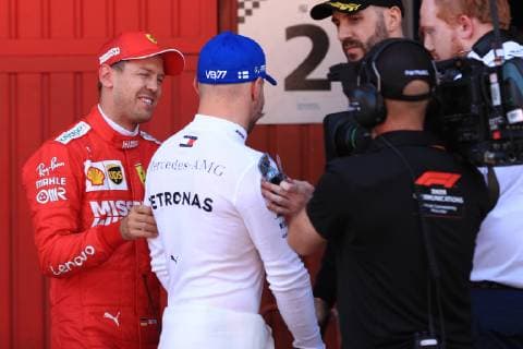 11th May 2019, Circuit de Barcelona-Catalunya, Barcelona, Spain; Formula One Grand Prix of Spain, qualification; Scuderia Ferrari, Sebastian Vettel talks with Mercedes AMG Petronas Motorsport, Valtteri Bottas after he takes pole  ActionPlus12133509 Octane