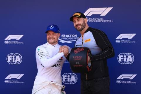 11th May 2019, Circuit de Barcelona-Catalunya, Barcelona, Spain; Formula One Grand Prix of Spain, qualification; Mercedes AMG Petronas Motorsport, Valtteri Bottas receives the Pirelli Pole Position Award from the Pirelli Representative, WWE Star Cesaro  ActionPlus12133510 Octane
