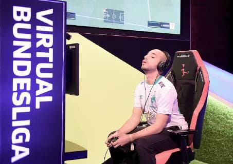 12.05.2019, xlakx, Esports VBL, Grand Final - in Berlin 2019 emspor, v.l.Mohammed MoAuba Harkous, E-Sportler, steht beim «Grand Final» der Virtual Bundesliga (VBL) im Westhafen Event & Convention Center. Die 24 besten Spieler Deutschlands kämpfen aufgeteilt in vier Gruppen auf Xbox und Playstation um den Titel. (DFL DFB REGULATIONS PROHIBIT ANY USE OF PHOTOGRAPHS as IMAGE SEQUENCES and or QUASI-VIDEO) Berlin *** 12 05 2019 xlakx Esports VBL Grand Final in Berlin 2019 emspor v l Mohammed MoAuba Harkous E Athlete is at the Grand Final of the Virtual Bundesliga VBL at the Westhafen Event Convention Center The 24 best players in Germany will fight in four groups on Xbox and Playstation for the title DFL DFB REGULATIONS PROHIBIT ANY USE OF PHOTOGRAPHS as IMAGE SEQUENCES and or QUASI VIDEO Berlin