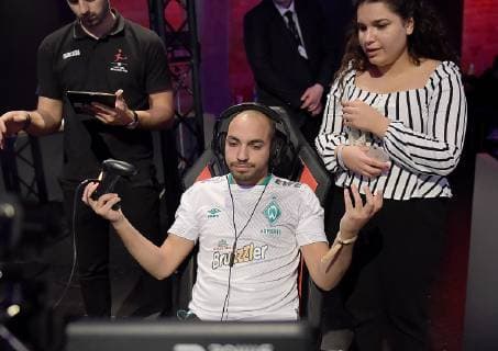 12.05.2019, xlakx, Esports VBL, Grand Final - in Berlin 2019 emspor, v.l.Mohammed MoAuba Harkous, E-Sportler, steht beim «Grand Final» der Virtual Bundesliga (VBL) im Westhafen Event & Convention Center. Die 24 besten Spieler Deutschlands kämpfen aufgeteilt in vier Gruppen auf Xbox und Playstation um den Titel. (DFL DFB REGULATIONS PROHIBIT ANY USE OF PHOTOGRAPHS as IMAGE SEQUENCES and or QUASI-VIDEO) Berlin *** 12 05 2019 xlakx Esports VBL Grand Final in Berlin 2019 emspor v l Mohammed MoAuba Harkous E Athlete is at the Grand Final of the Virtual Bundesliga VBL at the Westhafen Event Convention Center The 24 best players in Germany will fight in four groups on Xbox and Playstation for the title DFL DFB REGULATIONS PROHIBIT ANY USE OF PHOTOGRAPHS as IMAGE SEQUENCES and or QUASI VIDEO Berlin