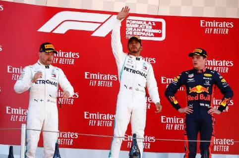 (L-R) Finnish Valtteri Bottas of Mercedes AMG, British Formula One driver Lewis Hamilton of Merdedes AMG and Dutch Max Verstappen of Red Bull celebrate on the podium after the Spanish Grand Prix held at Montmelo Circuit in Montmelo, Barcelona, Spain, 12 May 2019. 2019 Spanish Grand Prix !ACHTUNG: NUR REDAKTIONELLE NUTZUNG!  Copyright: xEnricxFoncubertax GRAFCAT8903 20190512-636932801708093157