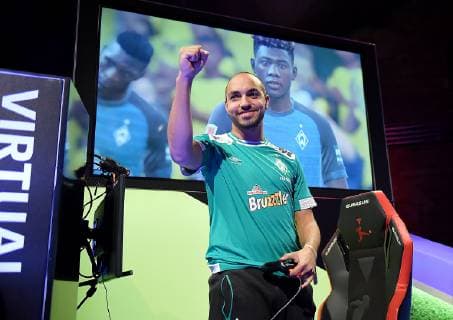 12.05.2019, xlakx, Esports VBL, Grand Final - in Berlin 2019 emspor, v.l.Freude,Jubel bei Mohammed MoAuba Harkous, E-Sportler, steht beim Grand Final der Virtual Bundesliga (VBL) im Westhafen Event & Convention Center. Die 24 besten Spieler Deutschlands kämpfen aufgeteilt in vier Gruppen auf Xbox und Playstation um den Titel. (DFL DFB REGULATIONS PROHIBIT ANY USE OF PHOTOGRAPHS as IMAGE SEQUENCES and or QUASI-VIDEO) Berlin *** 12 05 2019 xlakx Esports VBL Grand Final in Berlin 2019 emspor v l Freude Jubel bei Mohammed MoAuba Harkous E Athlete is at the Grand Final of the Virtual Bundesliga VBL at Westhafen Event Convention Center The 24 best players in Germany will fight in four groups on Xbox and Playstation for the title DFL DFB REGULATIONS PROHIBIT ANY USE OF PHOTOGRAPHS as IMAGE SEQUENCES and or QUASI VIDEO Berlin