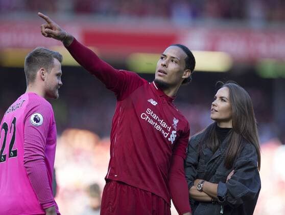 12th May 2019, Anfield, Liverpool, England; EPL Premier League football, Liverpool versus Wolverhampton Wanderers; Virgil van Dijk of Liverpool with his wife Rike Nootigedagt during the post match lap of honour  ActionPlus12134778 DavidxBlunsden