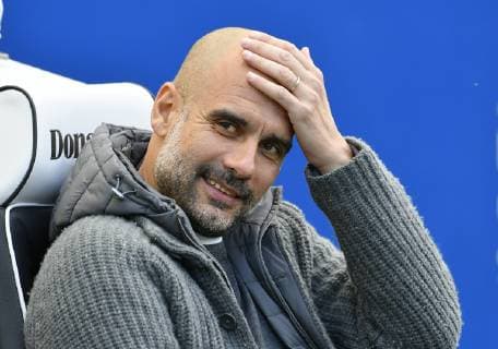 BRIGHTON, ENGLAND - MAY 12: Manchester City manager Pep Guardiola sits in the dugout ahead of the Premier League match between Brighton & Hove Albion and Manchester City at American Express Community Stadium on May 12, 2019 in Brighton, United Kingdom. SPO, SOC, FOC 