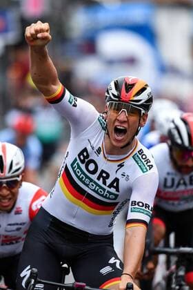 Pascal Ackermann (GER BORA-hansgrohe) gewinnt seine erste Grand-Tour Etappe beim Giro d Italia 2019 und Rudi Ruediger Selig (GER BORA-hansgrohe) freut sich riesig beim Ueberfahren der Ziellinie - Finish - Ziel - Zielsprint - Zielankunft - Finale - Final - Sprint - Jubel - Freude - Luck - Emotion - Emotionen - Mimik - Mimic - Gestik - Gestic - Aktion Rennszene - Hochformat - hoch - hochkant - vertikal - Event Veranstaltung: 102. Giro d Italia - 2.Etappe Stage 2: 20190512 - Stage 2 - Bologna nach to Fucecchio 205.0 km - Ort Location: Fucecchio - Region: Provinz Florenz - Land Country: Italien Italy Italia - Datum Date: 12.05.2019 Cycling Radsport 102. Giro d Italia - 2.Etappe 12.05.2019