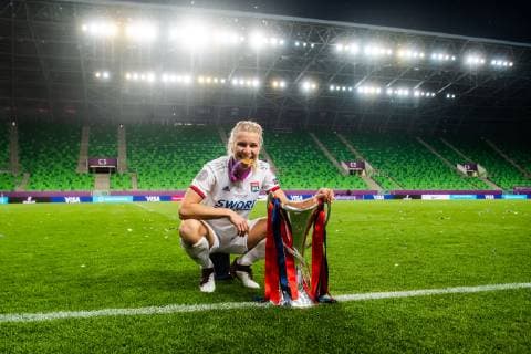 190518 Ada Hegerberg of Lyon poses for a portrait with her gold medal and the trophy after the UEFA Women s Champions League final match between Lyon and Barcelona on May 18, 2019 in Budapest. Photo: Jon Olav Nesvold BILDBYRAN kod JE 160443 Copyright: JONxOLAVxNESVOLD BB190518JE080
