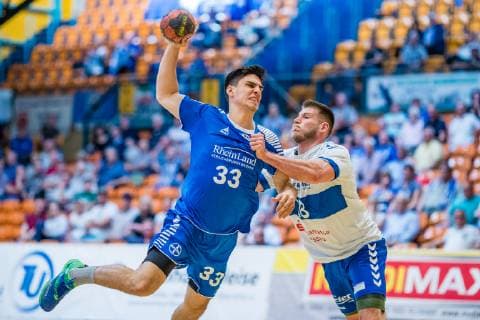 Eloy Morante Maldonado 33 (TSV Bayer Dormagen), Daniel Zele 28 (Dessau-Rosslauer HV 06) waehrend der Begegnung in der Handball 2. Bundesliga (Herren) - Saison 2018-2019 zwischen Dessau-Rosslauer HV 06 und TSV Bayer Dormagen in der Anhalt Arena am 19. May 2019 in Dessau-Rosslau, Sachsen Anhalt, Deutschland