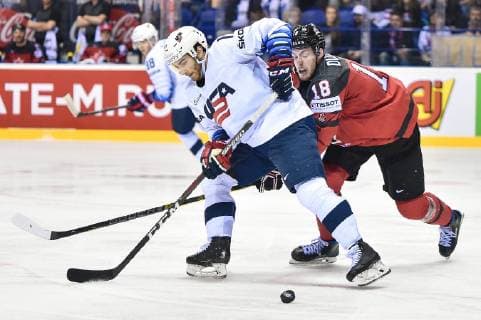 (190522) -- KOSICE, May 22, 2019 -- Pierre-Luc Dubois (R) of Canada tackles Luke Kunin of the United States during the 2019 IIHF Ice hockey, Eishockey World Championship, WM, Weltmeisterschaft Slovakia group A game between Canada and the United States at Steel Arena in Kosice, Slovakia, on May 21, 2019. Canada won 3-0. ) (SP)SLOVAKIA-KOSICE-ICE HOCKEY-IIHF-WORLD CHAMPIONSHIP-GROUP A-CAN VS USA LukaszxLaskowski 