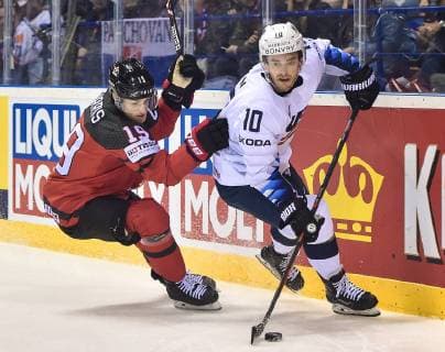 (190522) -- KOSICE, May 22, 2019 -- Kyle Turris (L) of Canada tackles Derek Ryan of the United States during the 2019 IIHF Ice hockey, Eishockey World Championship, WM, Weltmeisterschaft Slovakia group A game between Canada and the United States at Steel Arena in Kosice, Slovakia, on May 21, 2019. Canada won 3-0. ) (SP)SLOVAKIA-KOSICE-ICE HOCKEY-IIHF-WORLD CHAMPIONSHIP-GROUP A-CAN VS USA LukaszxLaskowski 