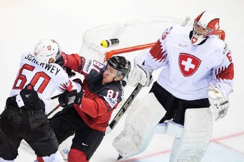 190523 Tristan Scherwey of Switzerland in a fight with Jonathan Marchessault of Canada during the 2019 IIHF Ice hockey, Eishockey World Championship, WM, Weltmeisterschaft quarterfinal game between Canada and Switzerland on May 23, 2019 in Kosice. Photo: Joel Marklund BILDBYRAN kod JM 87956 Copyright: JOELxMARKLUND BB190523JM029