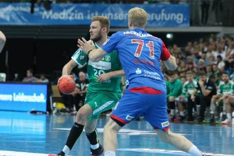 SC DHfK Leipzig vs.HC Erlangen, DKB-HBL, 23.05.19 Handball, 1. Bundesliga, Saison 2018 2019, 32. Spieltag: SC DHfK Leipzig vs. HC Erlangen am 23.05.19 in der Arena Leipzig. Im Bild: Philipp WEBER ( 20, DHfK Leipzig) gegen Andreas Schroeder ( 71, Erlangen)