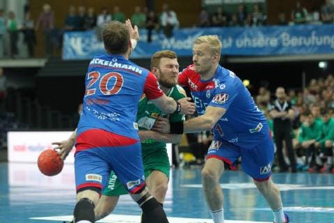 SC DHfK Leipzig vs.HC Erlangen, DKB-HBL, 23.05.19 Handball, 1. Bundesliga, Saison 2018 2019, 32. Spieltag: SC DHfK Leipzig vs. HC Erlangen am 23.05.19 in der Arena Leipzig. Im Bild: Philipp WEBER ( 20, DHfK Leipzig) gegen Nico Buedel ( 20, Erlangen) und Andreas Schroeder ( 71, Erlangen)