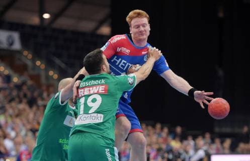 Nicolai Theilinger (Erlangen 3) gegen Bastian Roscheck (DHfK 19) beim Spiel SC DHfK Leipzig vs HC Erlangen, Handball, 1.Liga, 23.05.19 SC DHfK Leipzig vs HC Erlangen, Handball, 1.Liga, 23.05.19 Leipzig Copyright: xEIBNER ChristianxModlax EP_CMA