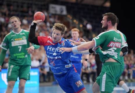 Jan Schffer Schaeffer (Erlangen 25) gegen Andreas Rojewski (DHfK 5) beim Spiel SC DHfK Leipzig vs HC Erlangen, Handball, 1.Liga, 23.05.19 SC DHfK Leipzig vs HC Erlangen, Handball, 1.Liga, 23.05.19 Leipzig Copyright: xEIBNER ChristianxModlax EP_CMA