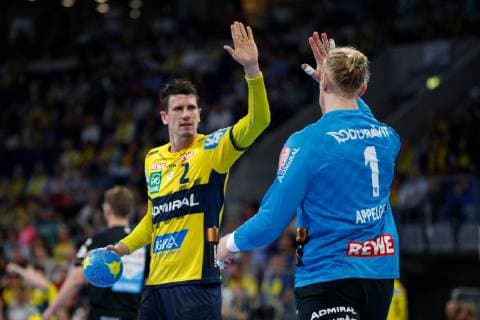 Rhein-Neckar-Loewen - Goeppingen Mannheim, Deutschland 23. Mai 2019 Handball Bundesliga; 31. Spieltag, in der SAP-Arena. v. li. Andy Schmid (Loewen) und Torwart Mikael Appelgren (Loewen)