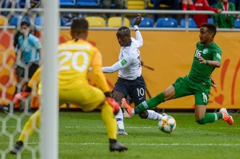 May 25, 2019 - Gdynia, Pomerania, Poland - Moussa Diaby from France (L) and Hazim Alzahrani from Saudi Arabia (R) are seen in action during FIFA U-20 World Cup match between France and Saudi Arabia (GROUP E) in Gdynia. France Vs Saudi Arabia in Gdynia, Poland - 25 May 2019 - ZUMAs197 20190525_zaa_s197_097 Copyright: xMateuszxSlodkowskix
