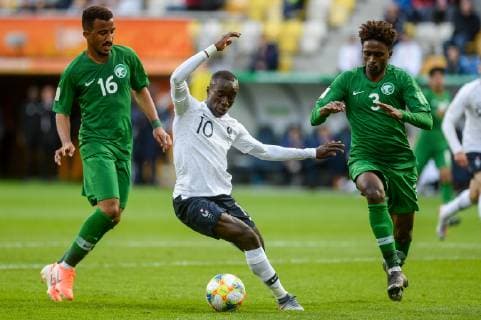 May 25, 2019 - Gdynia, Pomerania, Poland - Hazim Alzahrani from Saudi Arabia (L) Moussa Diaby from France (C) and Khalifah Aldawsari from Saudi Arabia (R) are seen in action during FIFA U-20 World Cup match between France and Saudi Arabia (GROUP E) in Gdynia. France Vs Saudi Arabia in Gdynia, Poland - 25 May 2019 - ZUMAs197 20190525_zaa_s197_098 Copyright: xMateuszxSlodkowskix