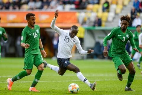 May 25, 2019 - Gdynia, Pomerania, Poland - Hazim Alzahrani from Saudi Arabia (L) Moussa Diaby from France (C) and Khalifah Aldawsari from Saudi Arabia (R) are seen in action during FIFA U-20 World Cup match between France and Saudi Arabia (GROUP E) in Gdynia. France Vs Saudi Arabia in Gdynia, Poland - 25 May 2019 - ZUMAs197 20190525_zaa_s197_116 Copyright: xMateuszxSlodkowskix