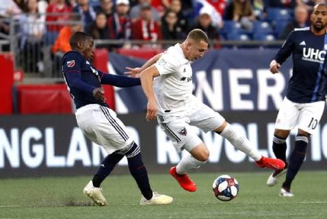 FOXBOROUGH, MA - MAY 25: New England Revolution midfielder Luis Caicedo (27) fouls DC United midfielder Russell Canouse (4) during a match between the New England Revolution and DC United on May 25, 2019, at Gillette Stadium in Foxborough, Massachusetts. (Photo by Fred Kfoury III Icon Sportswire) SOCCER: MAY 25 MLS, Fussball Herren, USA - DC United at New England Revolution Icon482190525002