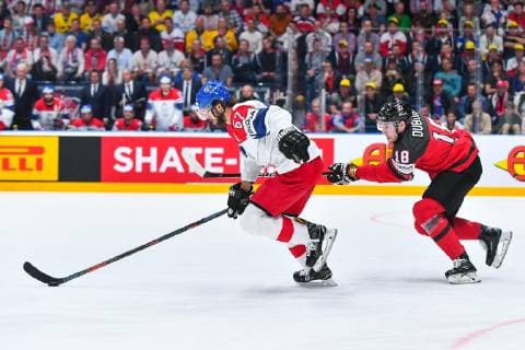 (190526) -- BRATISLAVA, May 26, 2019 -- Pierre-Luc Dubois (R) of Canada tackles Michael Frolik of the Czech Republic during the 2019 IIHF Ice hockey, Eishockey World Championship, WM, Weltmeisterschaft Slovakia semi final game between Canada and the Czech Republic at Ondrej Nepela Arena on May 25, 2019 in Bratislava, Slovakia. Canada won 5-1. ) (SP)SLOVAKIA-BRATISLAVA-ICE HOCKEY-IIHF-WORLD CHAMPIONSHIP-SEMIFINAL-CAN VS CZE PawelxAndrachiewicz 