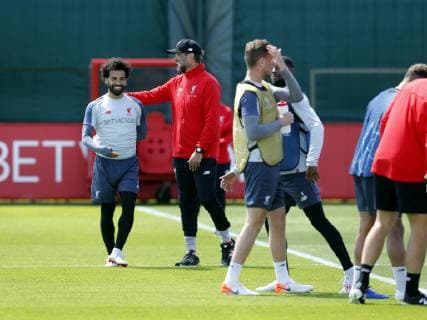 28th May 2019, Melwood Training Ground, West Derby, Liverpool, England; Liverpool FC training and press conference, PK, Pressekonferenz before their UEFA Champions League final versus Tottenham Hotspur on June 1st; Liverpool manager Jurgen Klopp shares a joke with Mohamed Salah during today s open training session at the club s Melwood training ground  ActionPlus12138962 AlanxMartin
