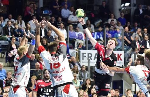 29.05.2019 - Handball - 1. Bundesliga DKB HBL - Saison 2018 2019 - 33. Spieltag: HC Erlangen Metropolregion Nürnberg HCE - MT Melsungen - OGo - Lasse Mikkelsen (15, MT Melsungen ) Philipp Müller Mueller (18, MT Melsungen ) Nikolai Link (33, HC Erlangen HCE )