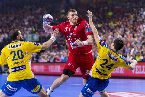Köln, Deutschland 01. Juni 2019: Handball - EHF CL Halbfinale - Telekom Veszprem HC vs. PGE Vive Kielce v.li. Mariusz Jurkiewicz (Kielce), Blaz Blagotinsek (Veszprem), Marko Mamic (Kielce) Köln Lanxess Arena Deutschland