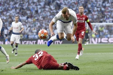 Harry Kane of Tottenham Hotspur competes for the ball with Joel Matip of Liverpool FC during the 2019 UEFA Champions League Final match between Tottenham Hotspur and Liverpool at Wanda Metropolitano Stadium, Madrid, Spain on 1 June 2019. Copyright: xGiuseppexMaffiax 24160138
