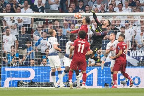 Madrid, Spain, 01.06.2019, UEFA Champions League - 2018 19 Season, Finale, Tottenham Hotspur - FC Liverpool, Virgil Van Dijk (Liverpool FC) and Goalkeeper Hugo Lloris (Tottenham Hotspur) battle for the ball ( Defodi-01059001175