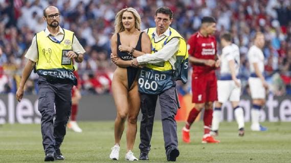 Madrid, Spain, 01.06.2019, UEFA Champions League - 2018 19 Season, Finale, Tottenham Hotspur - FC Liverpool, Security leads a supporter off the field ( Defodi-09-523-097695
