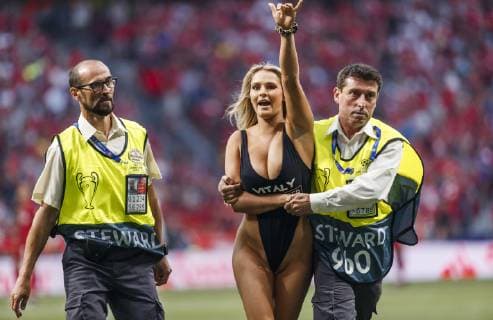 Madrid, Spain, 01.06.2019, UEFA Champions League - 2018 19 Season, Finale, Tottenham Hotspur - FC Liverpool, Security leads a supporter off the field ( Defodi-09-523-097696