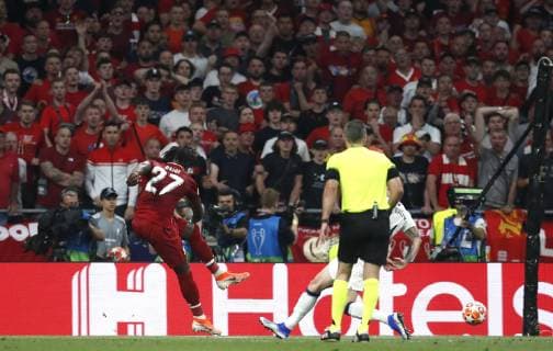 Divock Origi of Liverpool scores the second goal during the UEFA Champions League match at Wanda Metropolitano Stadium, Madrid. Picture date: 1st June 2019. Picture credit should read: David Klein Sportimage EDITORIAL USE ONLY. No use with unauthorised audio, video, data, fixture lists, club league logos or live services. Online in-match use limited to 120 images, no video emulation. No use in betting, games or single club league player publications. SPI-0089-0048