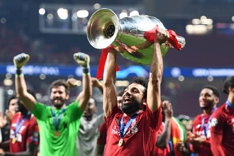 190601 Mohamed Salah of Liverpool celebrates with the throphy after the UEFA Champions League final between Tottenham and Liverpool on June 1, 2019 in Madrid. Photo: Petter Arvidson BILDBYRAN kod PA 92302 Copyright: PETTERxARVIDSON BB190601PA181
