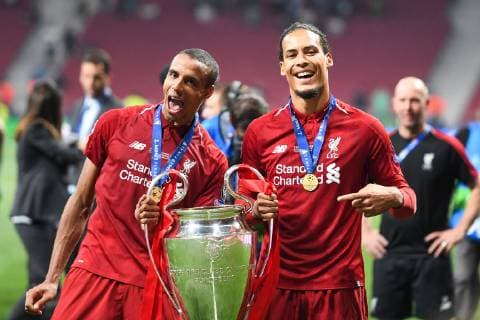 190601 Fabinho and Virgil van Dijk of Liverpool celebrate with the throphy after the UEFA Champions League final between Tottenham and Liverpool on June 1, 2019 in Madrid. Photo: Petter Arvidson BILDBYRAN kod PA 92302 Copyright: PETTERxARVIDSON BB190601PA184