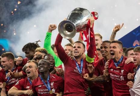 Jordan Henderson of Liverpool lifts the winning trophy during the UEFA Champions League FINAL match between Tottenham Hotspur and Liverpool at the Metropolitano Stadium (Stadium Metropolitano), Av. de Luis Aragon?s, 4, 28022 Madrid, Spain on 1 June 2019. Copyright: xAndyxRowlandx PMI-2850-0016