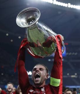 Jordan Henderson of Liverpool lifts the cup during the UEFA Champions League match at Wanda Metropolitano Stadium, Madrid. Picture date: 1st June 2019. Picture credit should read: David Klein Sportimage EDITORIAL USE ONLY. No use with unauthorised audio, video, data, fixture lists, club league logos or live services. Online in-match use limited to 120 images, no video emulation. No use in betting, games or single club league player publications. SPI-0089-0074
