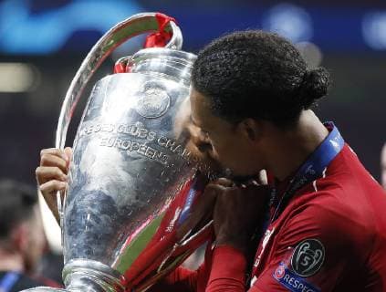 Virgil van Dijk of Liverpool kisses the cup during the UEFA Champions League match at Wanda Metropolitano Stadium, Madrid. Picture date: 1st June 2019. Picture credit should read: David Klein Sportimage EDITORIAL USE ONLY. No use with unauthorised audio, video, data, fixture lists, club league logos or live services. Online in-match use limited to 120 images, no video emulation. No use in betting, games or single club league player publications. SPI-0089-0088
